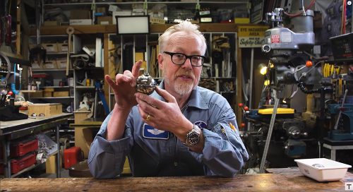 Adam Savage with a Master Replica Thermal Detonator